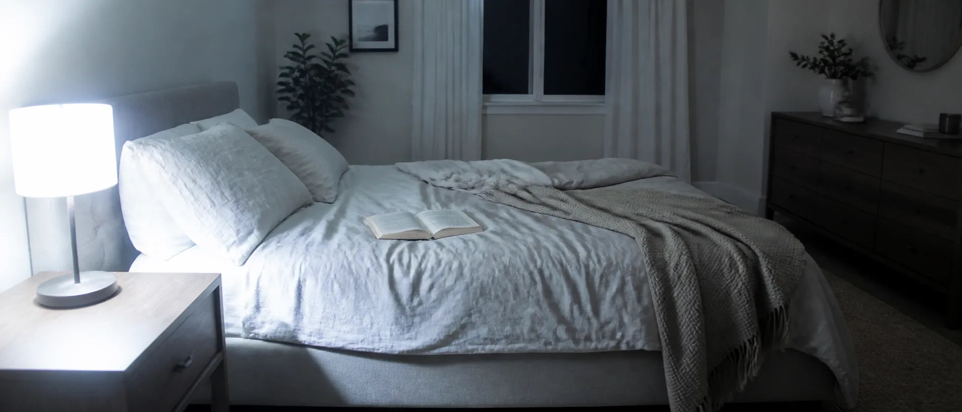 Bright bedside lamp illuminating an entire bedroom before Lumalli